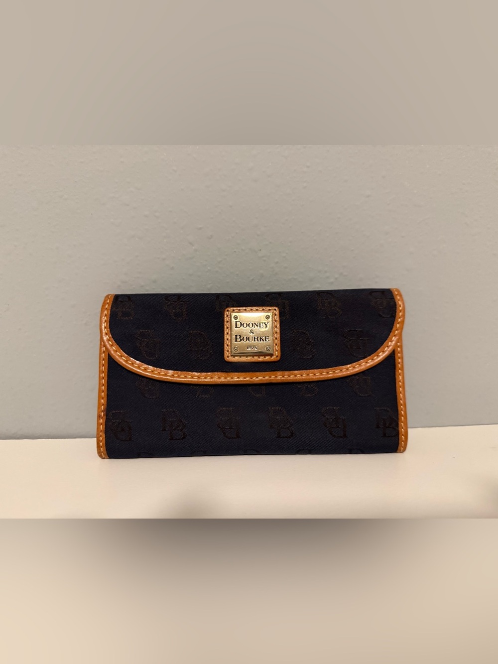 Dooney & Bourke Navy Signature Wallet with Tan Trim & Gold Plaque
